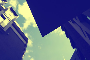 Abstract view of houses and sky