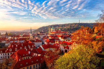 Amazing sunrise over Prague Old City, scenic top view of the historic medieval architecture from popular viewpoint on Prague Castle hill. Colorful cityscape of European capital, Czech Republic