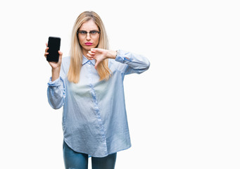 Sticker - Young beautiful blonde business woman showing screen of smartphone over isolated background with angry face, negative sign showing dislike with thumbs down, rejection concept