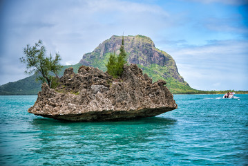 Crystal Rock in the turquoise waters of the Indian Ocean at Le Morne, Mauritius - Africa