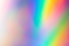 Blurry Abstract Iridescent Holographic Foil Background.