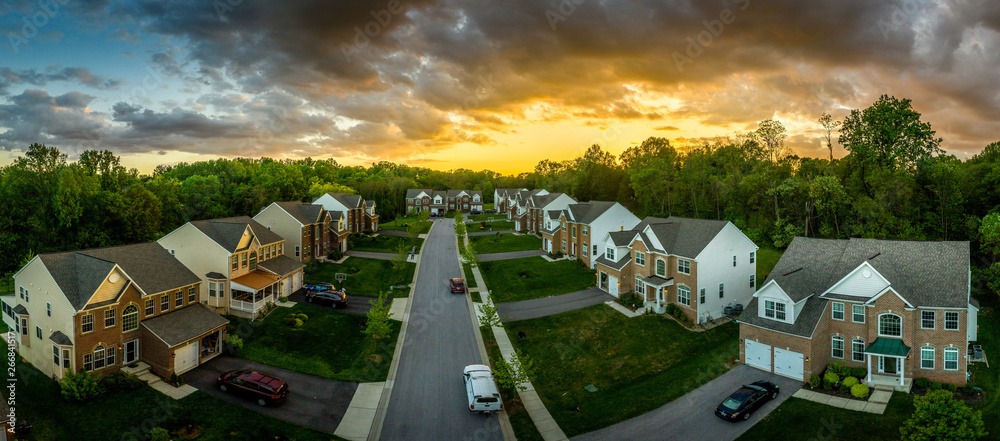 Aerial panorama of a modern row of newly constructed two story single ...