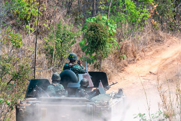 Wall Mural - Backside of  Soldier army operation, Grunge style image of modern armored tanks in battle