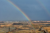 Fototapeta Tęcza - rainbow over city