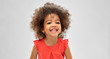 © Syda Productions - childhood and people concept - happy little african american girl over grey background