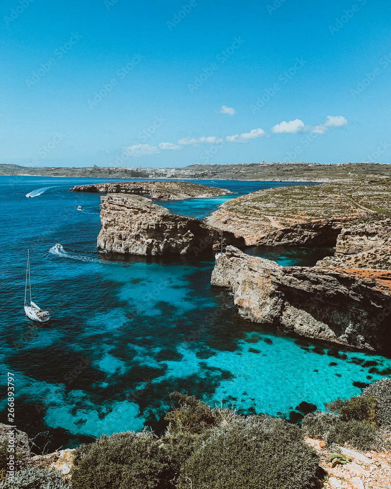 Blue lagoon in Comino Island, Malta. Nature summer seascape in Malta. Travel and tourism in malta.  - obrazy, fototapety, plakaty 