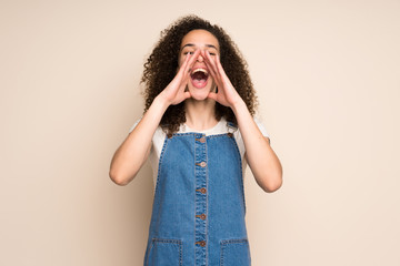 Wall Mural - Dominican woman with overalls shouting and announcing something