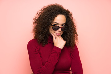 Wall Mural - Dominican woman with turtleneck sweater laughing