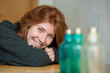© Westend61 - Portrait of happy redheaded teenage girl