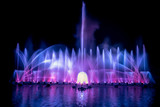 Fototapeta Tęcza - The colorful fountain dancing in celebration festival with dark night sky background.