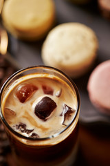 Poster - Iced latte with macaroons on background