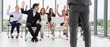 © InfiniteFlow - Businesswomen and businessmen attending group meeting conference in office room. Corporate business team concept.