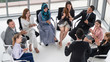 © InfiniteFlow - Businesswomen and businessmen attending group meeting conference in office room. Corporate business team concept.