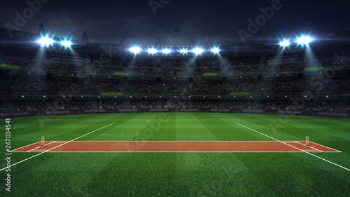 Fotomural Illuminated round cricket stadium full of fans at night upper side view