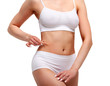 © Nobilior - Woman pinches fat on her belly, closeup shot