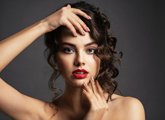 Poster - Beautiful young woman with long curly brown hair