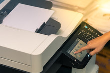 Woman's Hand Touching The Screen To Copy Documents From Photocopiers Or Multifunction Machine.