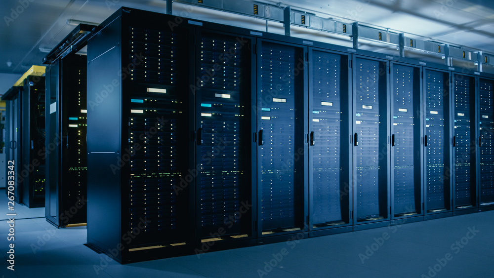 Obraz Shot of Data Center With Multiple Rows of Fully Operational Server Racks. Modern Telecommunications, Cloud Computing, Artificial Intelligence, Database, Super Computer Technology Concept. fototapeta, plakat