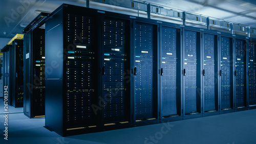 Fotomural Shot of Data Center With Multiple Rows of Fully Operational Server Racks