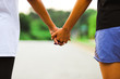 © Anthony - Sisters holding hands on blurred background