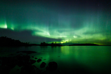 Wall Mural - beautiful northern lights over lake