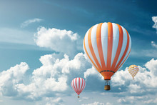 Multicolored, Large Balloons Against The Blue Sky. Travel Concept, Dream, New Emotions, Travel Agency.