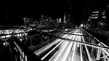 Brooklyn Bridge Traffic Lights Lines Trails At Night New York, USA, Long Exposure Time, Slow Shutter, Black And White.