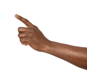 African-American man pointing at something on white background, closeup