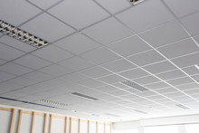 Suspended Ceiling With LED Square Lamps Sin The Office