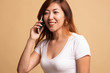© halfbottle - Young Asian woman talking with mobile phone.