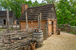 18th century farm slave cabin on a sunny day