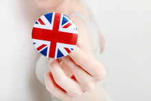 The Flag Of Great Britain, Printed On Button Badge, Holding By Woman