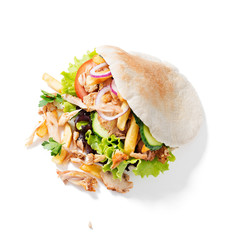 Doner kebab or gyro isolated on white background .