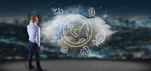 Poster - Businessman in front of a World globe surronding by ecology icons and connection 3d rendering