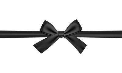 Black gift ribbon and bow on black background.