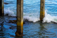 Waves Smashing Against Pier 