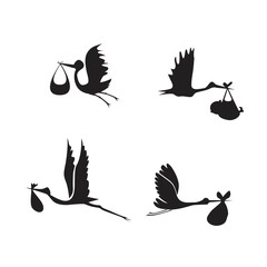 Wall Mural - stork and baby set black on white background