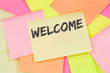 © Markus Mainka - Welcome new employee colleague refugees refugee immigrants note paper
