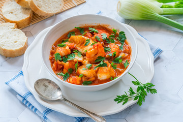 Canvas Print - Tiger prawn and fish stew in a bowl