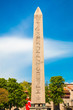 Obelisk of Theodosius (Dikilitas) with hieroglyphs in Sultanahmet Square, Istanbul, Turkey. Ancient Egyptian obelisk in Istanbul City