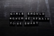 © syahrir - Girls should never be afraid to be smart on wooden blocks. Education, Motivation and inspiration concept