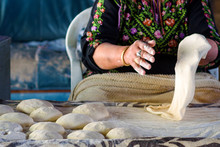 Close Up Of Old Arab Woman Hands Kneading Fresh Dough For Taboon Bread Or Lafah Is A Middle Eastern Flatbread Also Called Lafa Or Iraqi Pita.