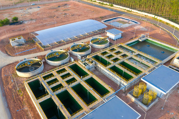 Sewage Farm: Aerial drone photo looking down onto a wide angle view of a waste water treatment processing plan