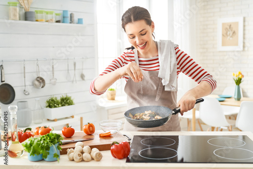 woman is preparing proper meal Tableau sur Toile
