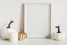 Front View Composition With Photo Frame And White Pumpkins. Copy Space For Artwork. Autumn Decor In Interior Fragment