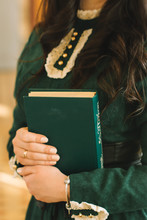 Girl In Green Dress With Green Book
