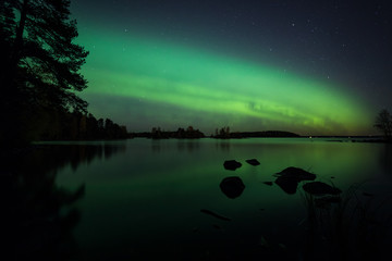 Wall Mural - beautiful northern lights over lake