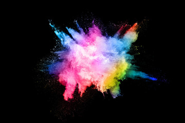 abstract colored dust explosion on a black background.abstract powder splatted background,Freeze motion of color powder exploding/throwing color powder, multicolored glitter texture.