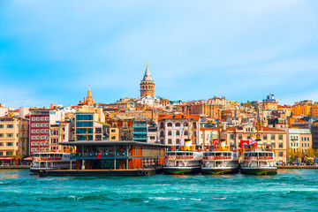 Wall Mural - Galata Tower in istanbul City of Turkey.  View of the Istanbul City of Turkey with bosphorus, seagulls and boats.