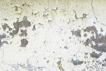 old white cracked paint on the cement wall background